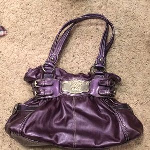 Kathy Van Zeeland purple metallic purse